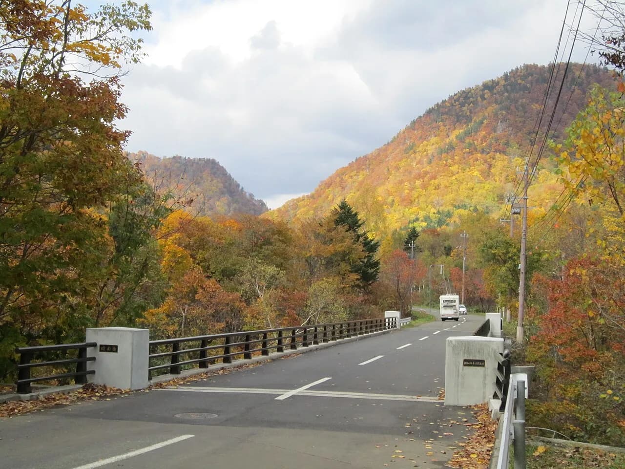 Shigure Bridge in the Jozankei area, surrounded by autumn colours.