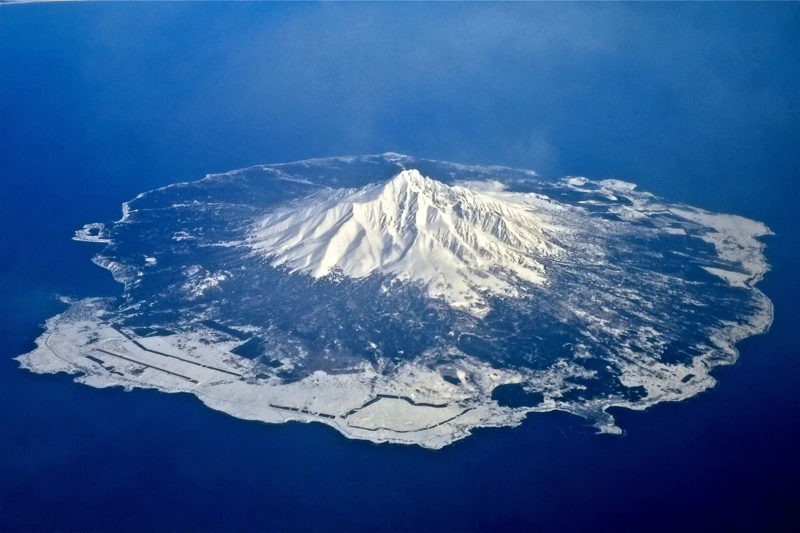 Rishiri Island from the air, with snow-covered Mount Rishiri (photographed April 2012).
