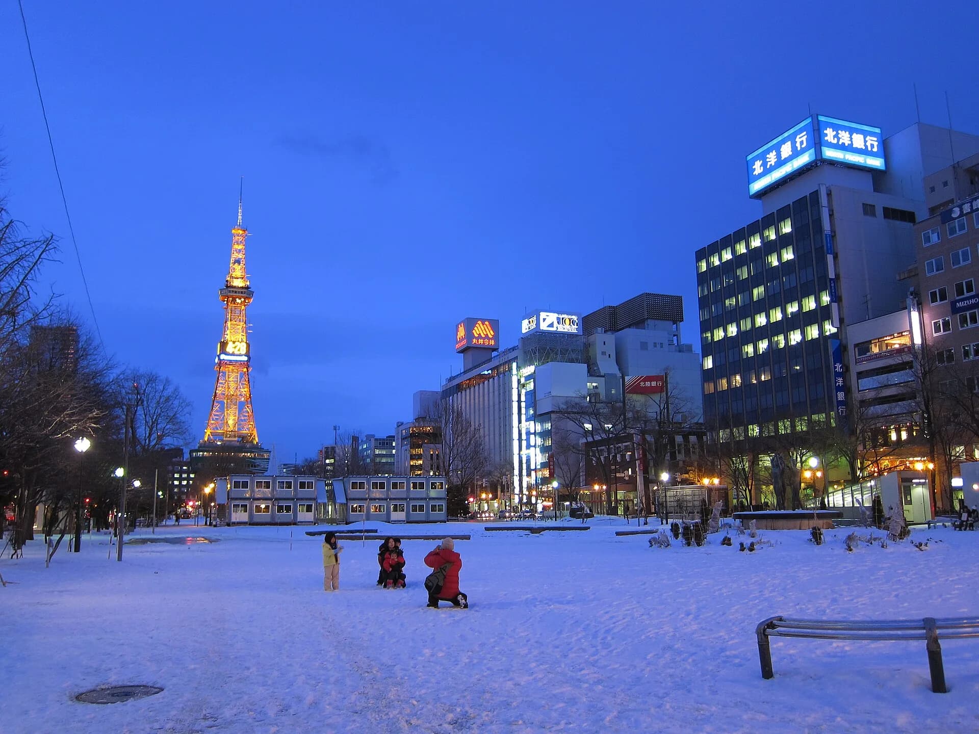 Odori Park and Sapporo TV Tower on a winter evening.